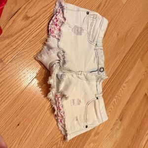 White Distressed Denim Shorts with Floral Accents